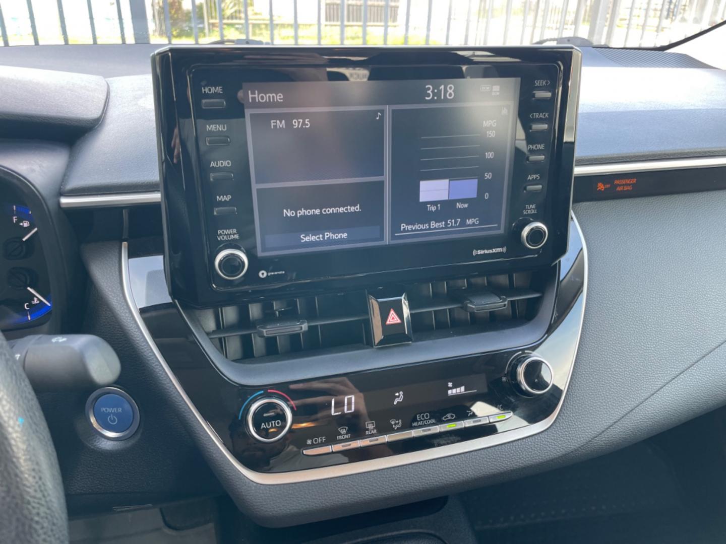 2022 Blue /Silver Toyota Corolla LE (JTDEAMDEXNJ) with an 1.8L Hybrid engine, Automatic transmission, located at 1501 West 15th St., Houston, 77008, (713) 869-2925, 29.797941, -95.411789 - Photo#10